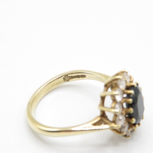 37 - 9ct gold ring with dark stone and CZ size O  4.2g