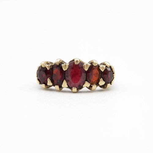 60 - 9ct gold and garnet ring size N  3.9g