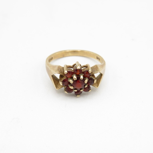 76 - 9ct gold and garnet ring size F  2.2g