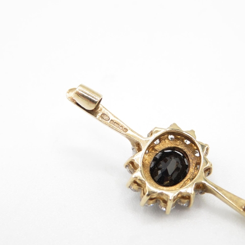 79 - 9ct gold, CZ and sapphire bar brooch 37mm long  3.4g