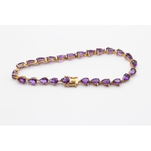 106 - 14ct Gold Amethyst Tennis Bracelet (7g)