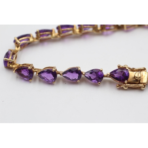 106 - 14ct Gold Amethyst Tennis Bracelet (7g)