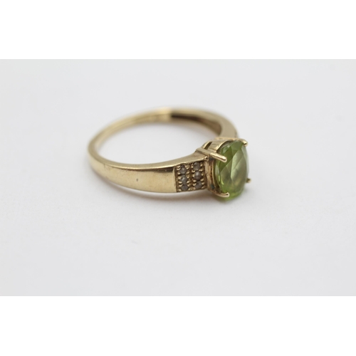 11 - 9ct Gold Peridot Single Stone Ring With Diamond Sides (2.8g) Size O