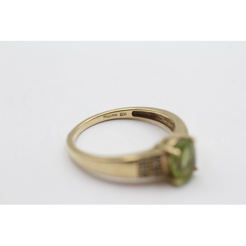 11 - 9ct Gold Peridot Single Stone Ring With Diamond Sides (2.8g) Size O