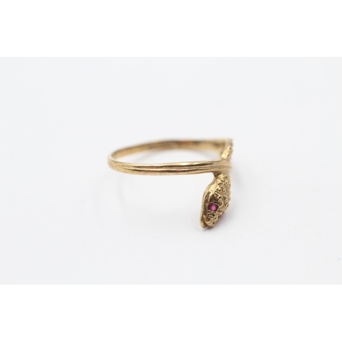 131 - 9ct Gold Snake Ring With Ruby Eyes (1.2g) Size N