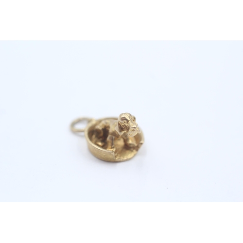 137 - 9ct Gold Sitting Puppy Pendant (3.5g)