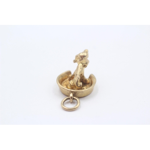 137 - 9ct Gold Sitting Puppy Pendant (3.5g)