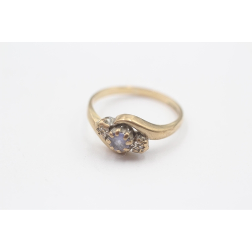 143 - 9ct Gold Diamond & Tanzanite Three Stone Ring (2.2g) Size N