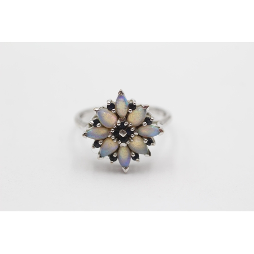 147 - 9ct White Gold White Opal & Sapphire Floral Cluster Ring (3.4g) Size P