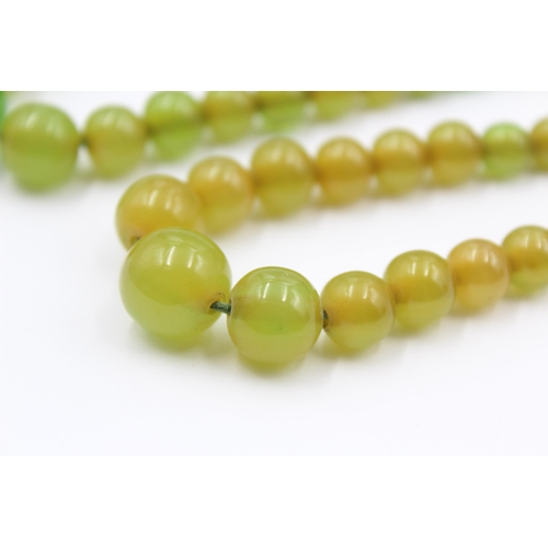 157 - Two Apple juice Bakelite Bead Necklaces For Restringing (38g)