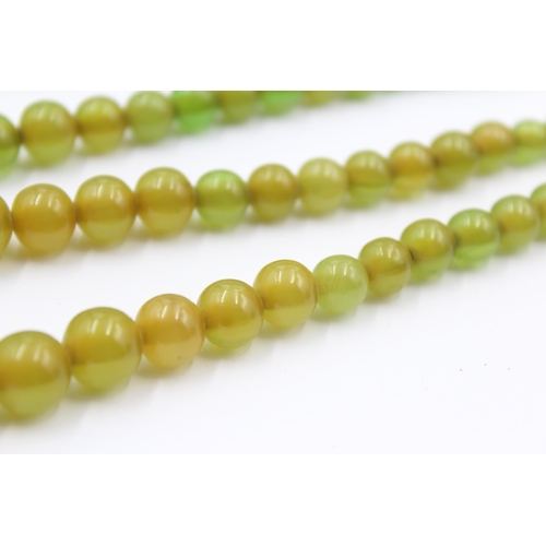 157 - Two Apple juice Bakelite Bead Necklaces For Restringing (38g)