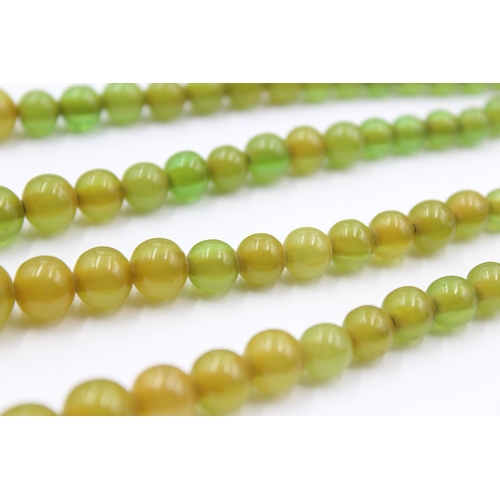 157 - Two Apple juice Bakelite Bead Necklaces For Restringing (38g)