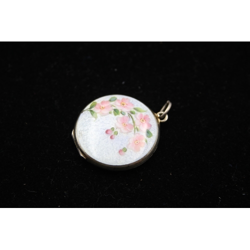 187 - A Silver Guilloche Enamel Floral Locket (16g)