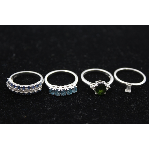 195 - Four Silver Gemstone Set Dress Rings By Tggc Including Topaz And Sapphire (13g)