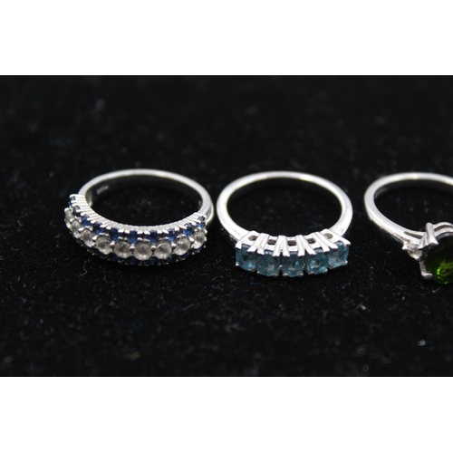 195 - Four Silver Gemstone Set Dress Rings By Tggc Including Topaz And Sapphire (13g)