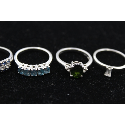 195 - Four Silver Gemstone Set Dress Rings By Tggc Including Topaz And Sapphire (13g)