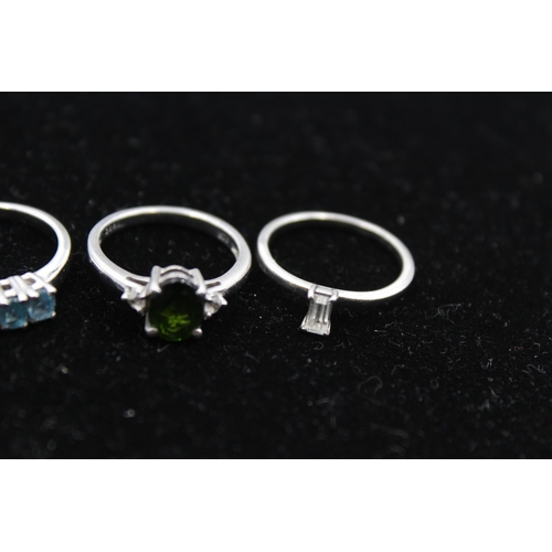 195 - Four Silver Gemstone Set Dress Rings By Tggc Including Topaz And Sapphire (13g)