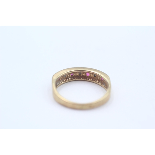 5 - 9ct Gold Diamond & Ruby Seven Stone Ring (3g) Size M