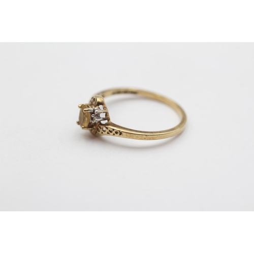 50 - 9ct Gold Diamond & Citrine Five Stone Twist Ring (1.4g) Size N