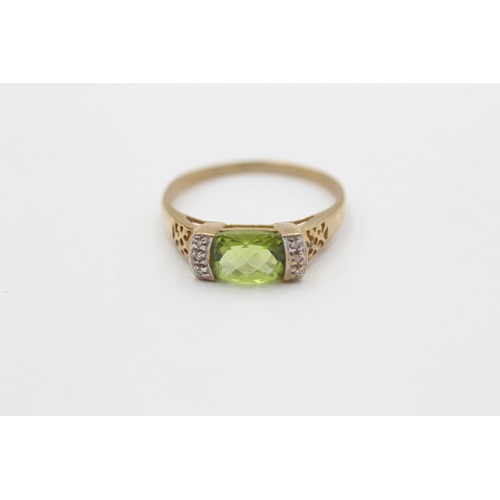 62 - 9ct Gold Peridot Single Stone Ring With Diamond Sides (2.4g) Size S