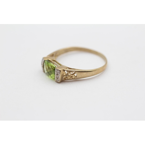 62 - 9ct Gold Peridot Single Stone Ring With Diamond Sides (2.4g) Size S