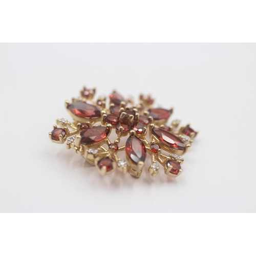 89 - 9ct Gold Diamond & Garnet Floral Cluster Brooch (5g)