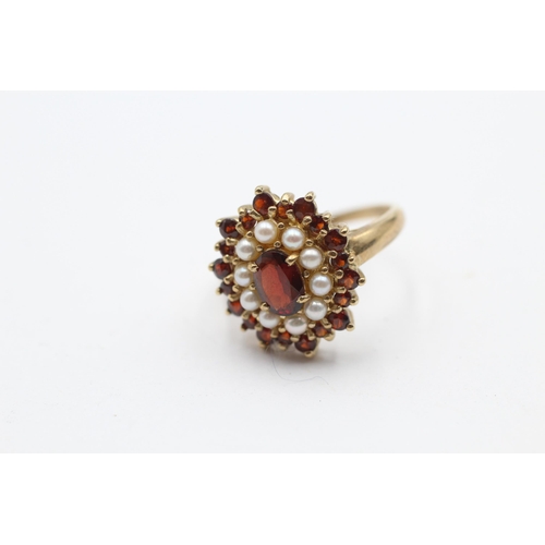 100 - 9ct Gold Garnet & Seed Pearl Oval Cluster Ring (4.2g) Size  P