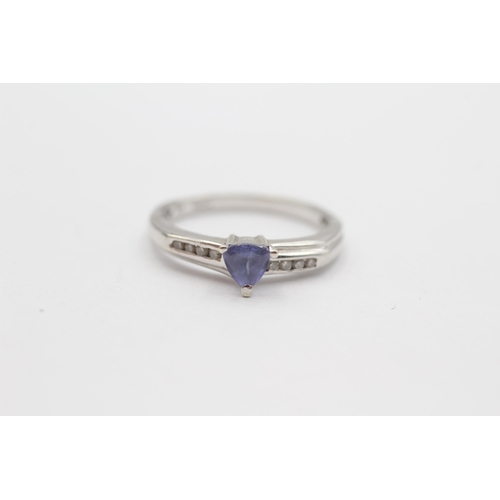 108 - 9ct White Gold Tanzanite Single Stone Ring With Diamond Set Shank (2.5g) Size  O