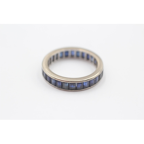 141 - 9ct White Gold Sapphire Eternity Ring (3.7g) Size  N