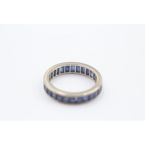 141 - 9ct White Gold Sapphire Eternity Ring (3.7g) Size  N