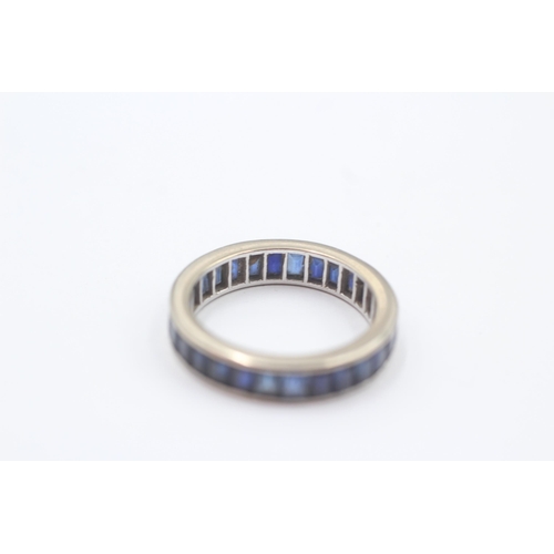 141 - 9ct White Gold Sapphire Eternity Ring (3.7g) Size  N