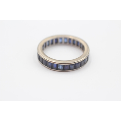 141 - 9ct White Gold Sapphire Eternity Ring (3.7g) Size  N