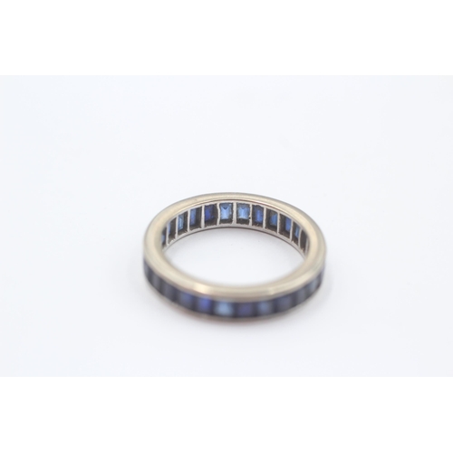 141 - 9ct White Gold Sapphire Eternity Ring (3.7g) Size  N