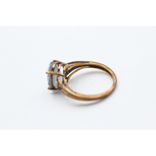57 - 9ct Gold Coated Topaz Single Stone Ring With Diamond Sides (2.6g) Size  O