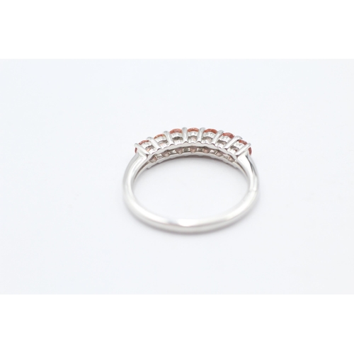 59 - 9ct White Gold Orange Gemstone Seven Stone Ring (2.6g) Size  N