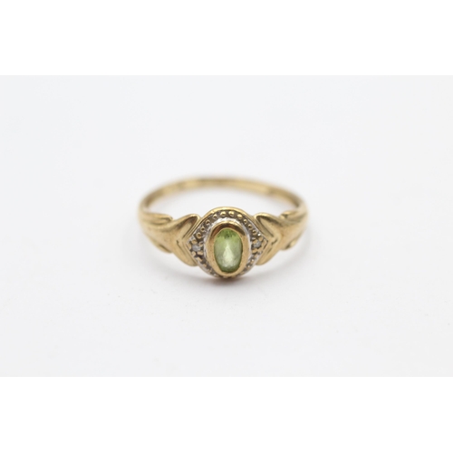 70 - 9ct Gold Peridot Single Stone Ring With Diamond Surround (1.4g) Size  N