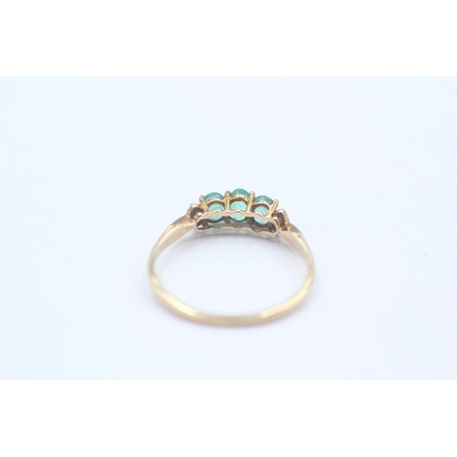 78 - 9ct Gold Emerald Three Stone Ring With Diamond Sides (1.3g) Size  O