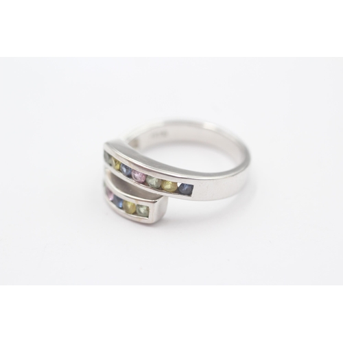 86 - 9ct White Gold Vari-Hue Sapphire Bypass Ring (5.5g) Size  N