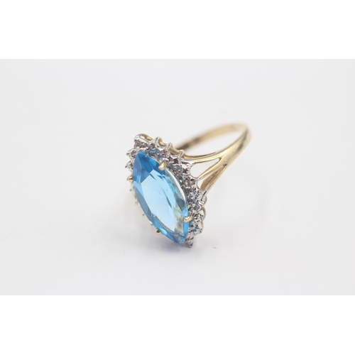 9 - 9ct Gold Blue Topaz Single Stone Ring With Diamond Surround (3g) Size  N