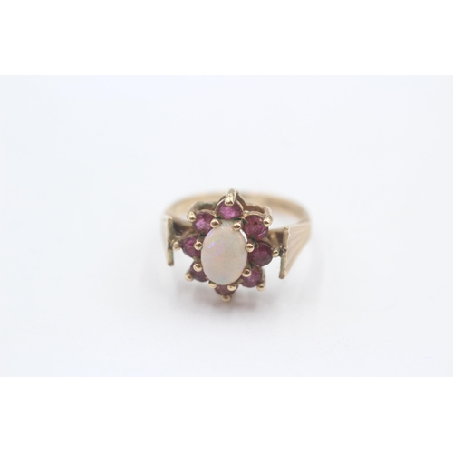 95 - 9ct Gold White Opal & Ruby Oval Cluster Ring (2.7g) Size  J