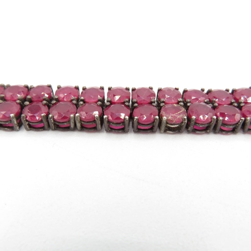 185 - Two Silver Ruby And Emerald Set Tennis Bracelets (45g)