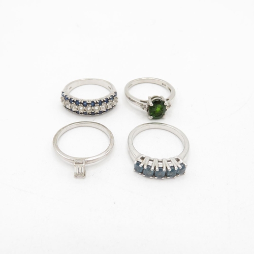 195 - Four Silver Gemstone Set Dress Rings By Tggc Including Topaz And Sapphire (13g)