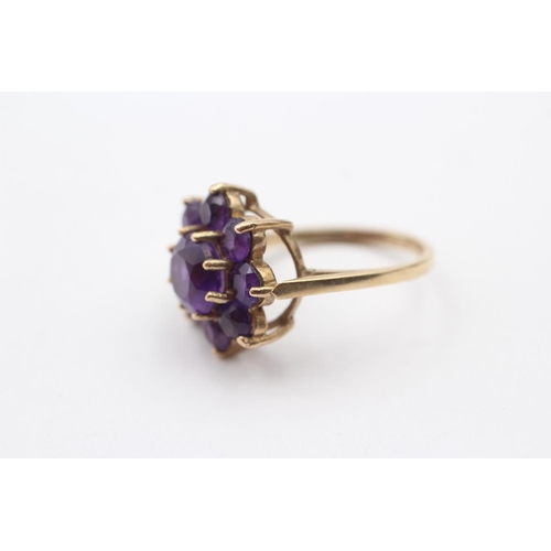 129 - 9ct Gold Amethyst Floral Cluster Ring (4.2g) Size  M 1/2