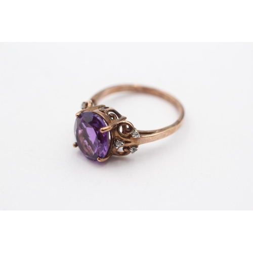 158 - 9ct Gold Amethyst Single Stone Ring With White Gemstone Sides (3.4g) Size  O