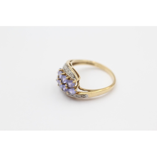 46 - 9ct Gold Diamond & Tanzanite Twisted Dress Ring (3.2g) Size  O 1/2