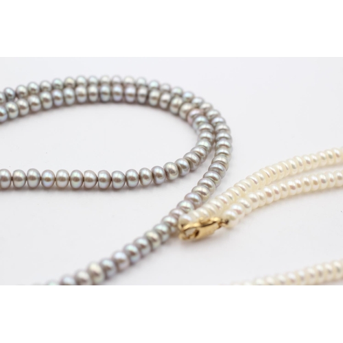 61 - 2 X 9ct Gold Clasped Button Pearl Necklaces (35g)