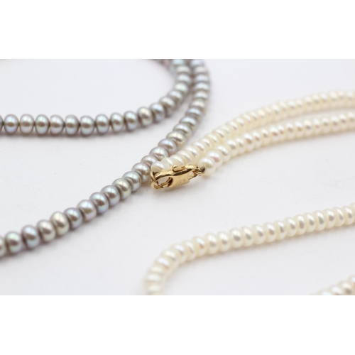 61 - 2 X 9ct Gold Clasped Button Pearl Necklaces (35g)