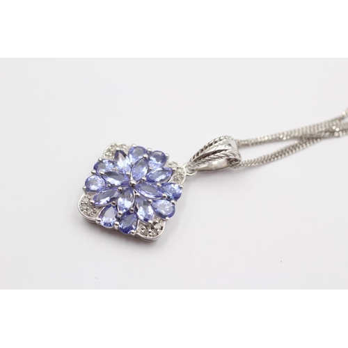 71 - 9ct White Gold Tanzanite Cluster Pendant Necklace (4g)