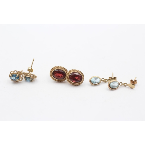 76 - 3 X 9ct Gold Paired Gemstone Earrings Inc. Garnet & Blue Topaz (4.4g)