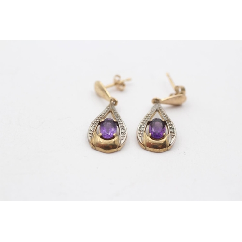 85 - 2 X 9ct Gold Paired Gemstone Earrings Inc. Garnet & Amethyst (4.2g)